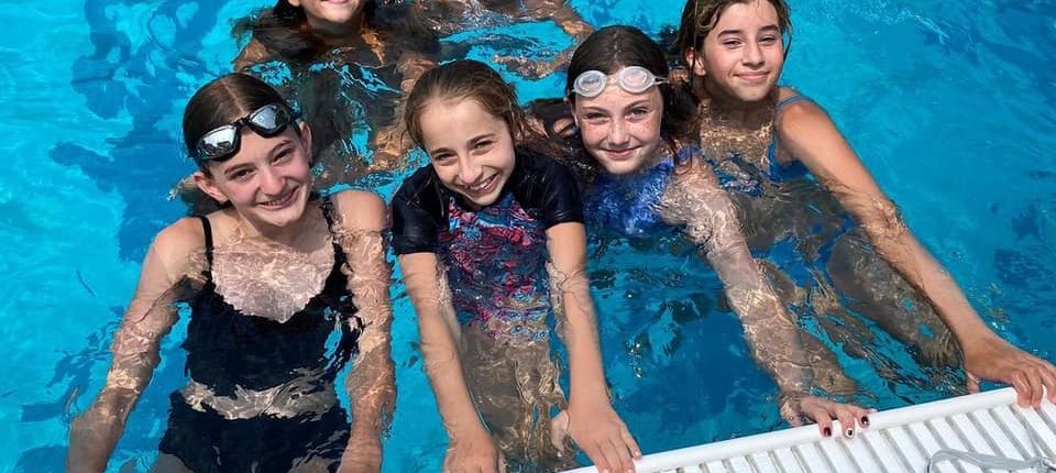 girls in pool at Westport Weston Family YMCA