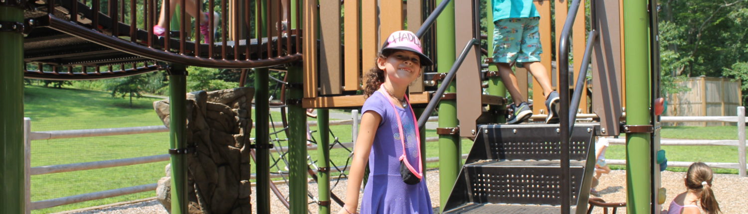 girl in playground at Westport Weston Family YMCA