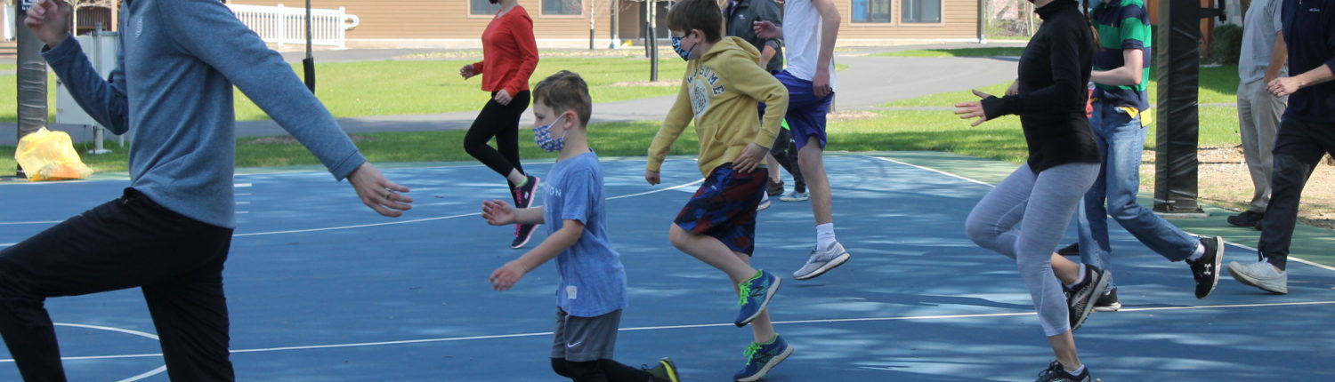 Kids running with Special Needs Track group
