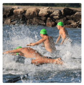 Westport Weston YMCA Point to Point open water swim at Compo beach swimmers take to the water