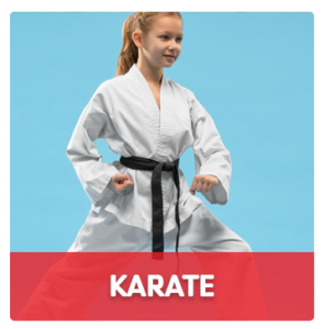 YMCA young smiling girl practicing karate