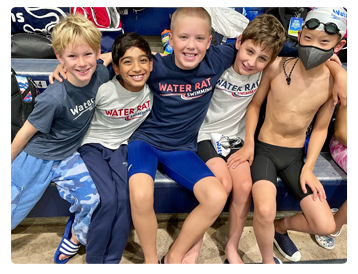 Group of smiling Water Rat Swim team members from Westport Weston YMCA