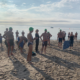 Swimmers getting ready to race at Westport Weston YMCA 44th Point to Point at Compo Beach, Westport, CT.